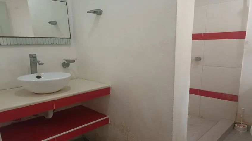 un baño completo en torre xell playa del carmen