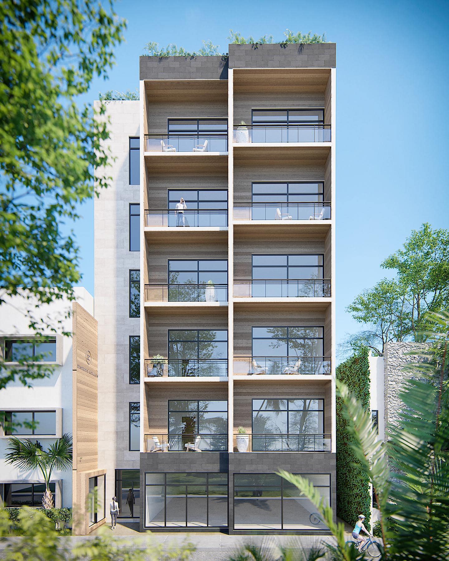 una fachada de un edificio nuevo con locales en renta en distrito corazon playa del carmen