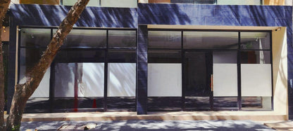 una fachada de un local comercial en distrito corazon playa del carmen