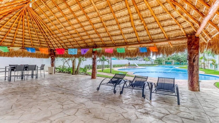 una palapa para eventos en residencial lunamar playa del carmen