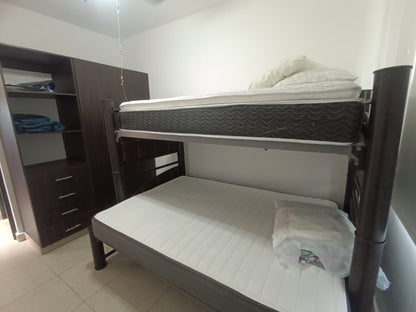 una recamara y una litera en residencial lunamar playa del carmen