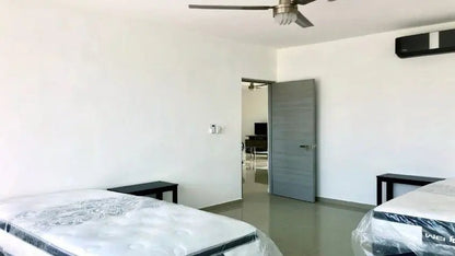 una recamara secundaria en condo uxmal playa del carmen