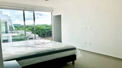 una recamara principal en condo uxmal playa del carmen