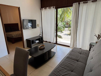 una sala con vista al exterior en golf drive playacar