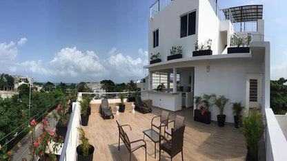 una terraza en torre xell playa del carmen