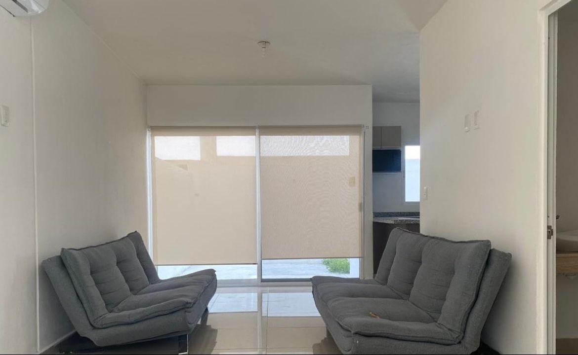 un area de sofa en villas bonanza playa del carmen
