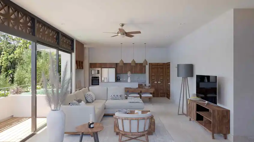 una sala y una terraza con jacuzzi en muwan tulum