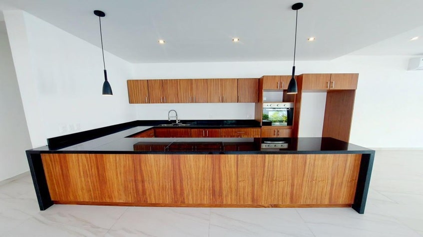 una cocina integral equipada con grandes espacios en fraccionamiento playa magna