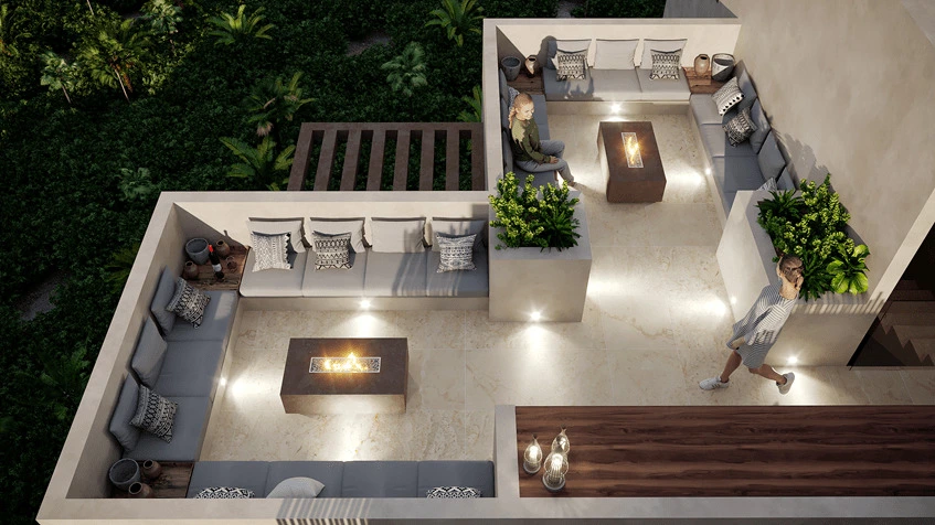 una terraza con fogateros, un area lounge y 2 personas platicando en kaban holbox