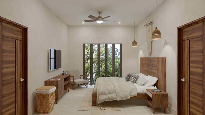 una recamara con cama matrimonial,una tv y un ventilador de techo en muwan tulum