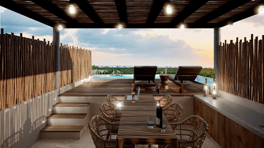 una terraza de madera, un comedor y 2 personas en la alberca en kaban holbox