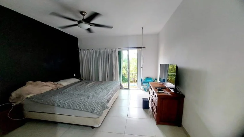una recamara secundaria en condominio bugambilias playa del carmen