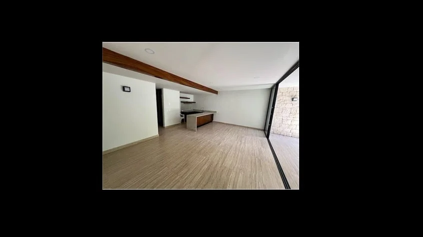 una sala con una cocina en samsara tulum