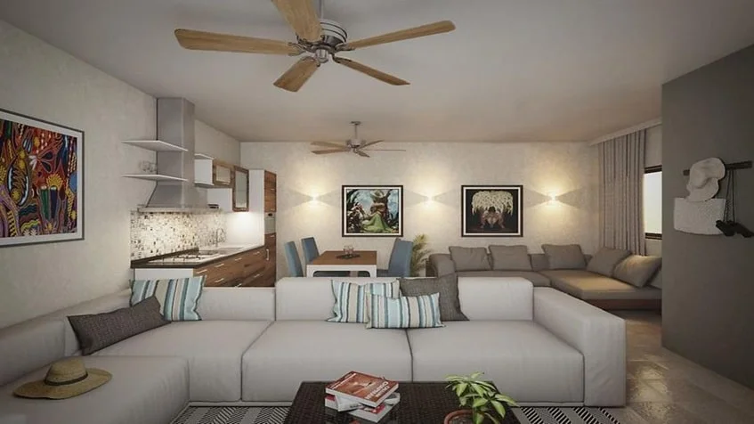 una sala con sofa, un cuadro decorativo y un ventilador en zazil 20 playa del carmen