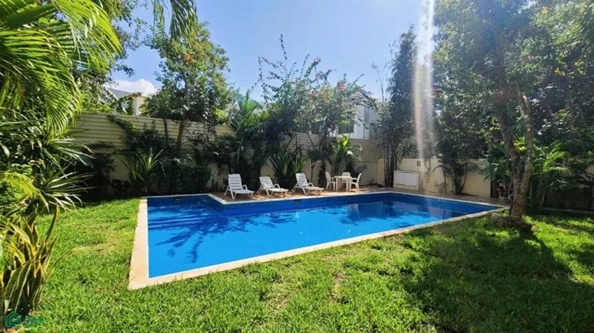 una alberca comun en ocean blue playa del carmen