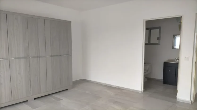 un área de closets en condo jim ejidal playa del carmen