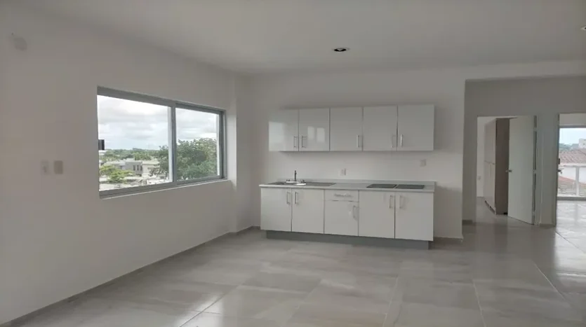 una cocina equipada en condo jim ejidal playa del carmen